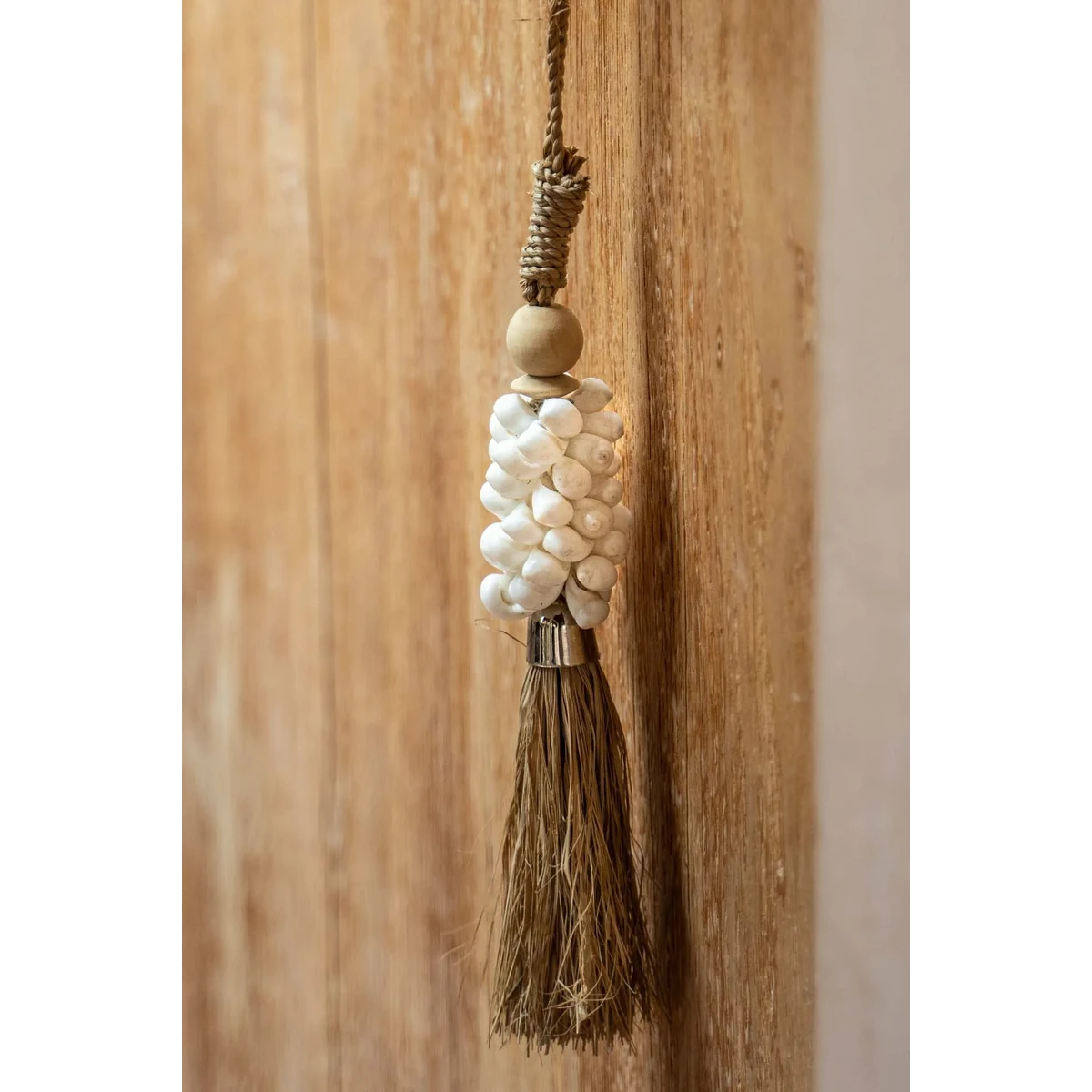 KAURI UND RAFFIA QUASTE